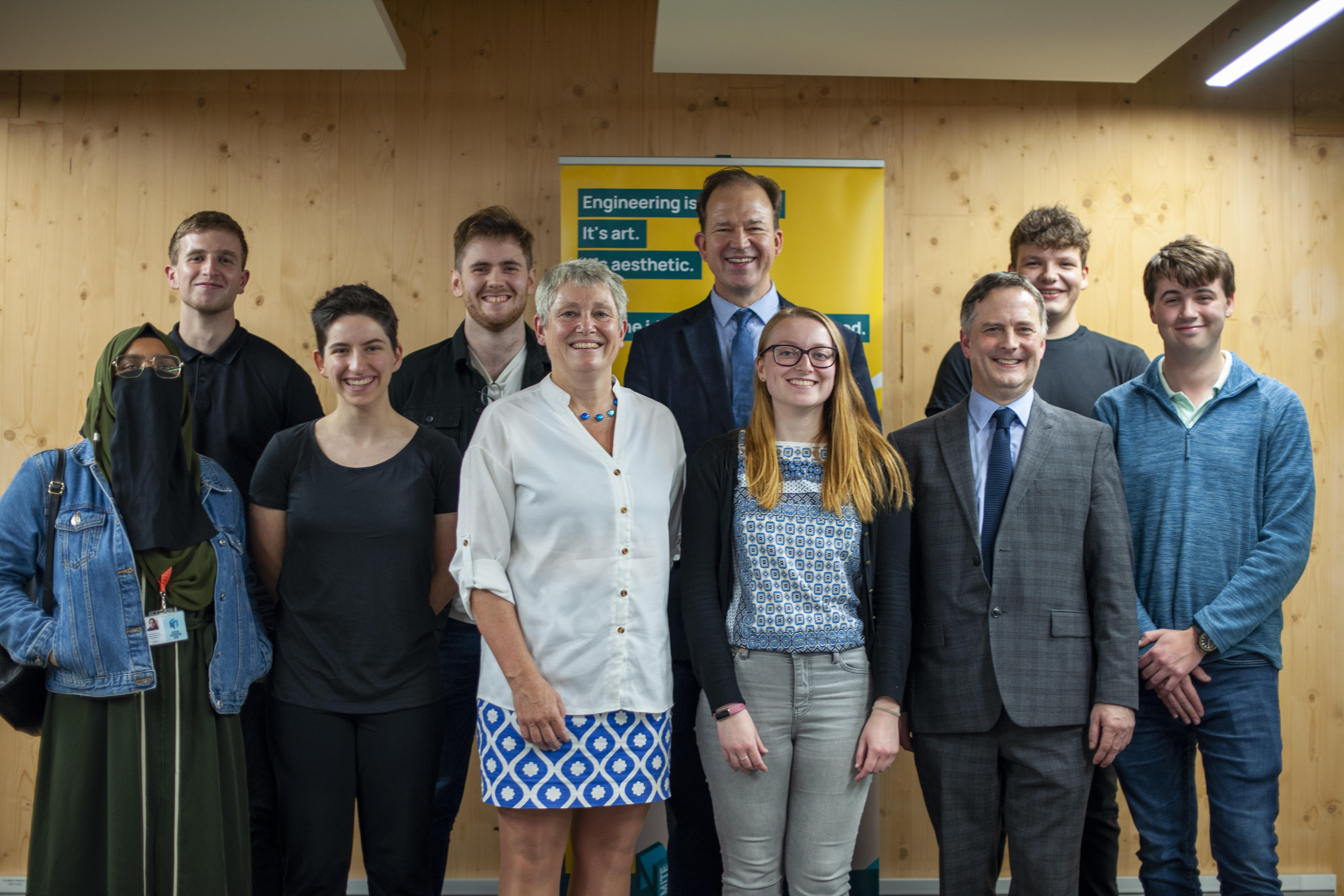 Kate Bingham, Jesse Norman and James Newby with NMITE students at the Centre for Advanced Timber Technology