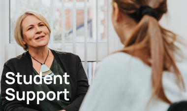 NMITE Student support services. Image features of Head of Student Lifecycle speaking with a female student
