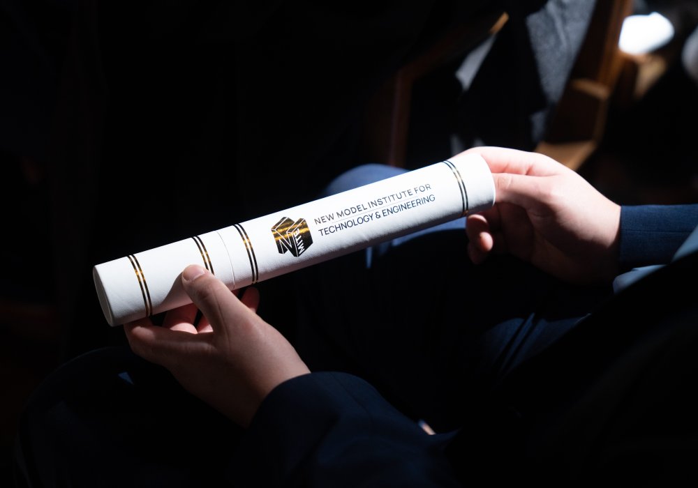 A white NMITE scroll