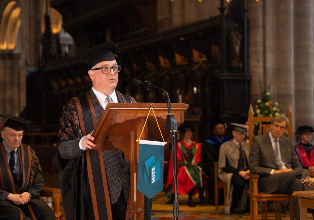 James Newby speaking at NMITE's 2026 graduation ceremony