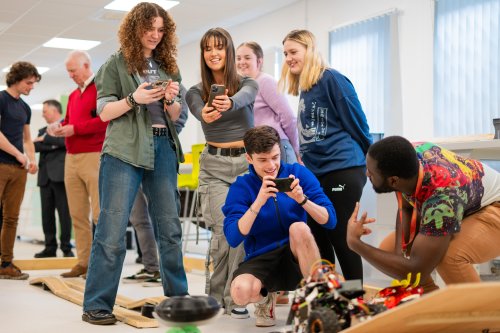 A group of NMITE students at their mechatronics project 