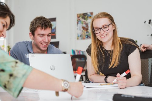 Man and Woman taking part in a uni activity