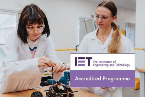 Female engineers working on a project with the IET logo in the bottom right corner