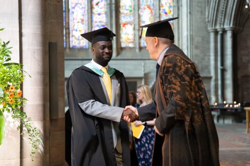 James Newby and NMITE graduate shaking hands