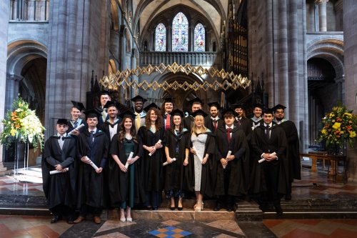 NMITE Graduates stood in the Hereford Cathedral