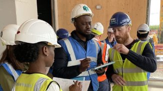 Research Fellow Gabriele Tamagnone informs a group of NMITE students on building sustainably.