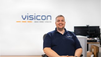 Peter Jelf, Founder and Director of Visicon with Visicon branding in the background