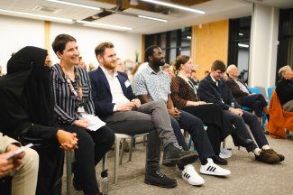 People on seats at showcase event