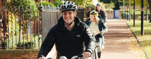 Students on beryl bikes