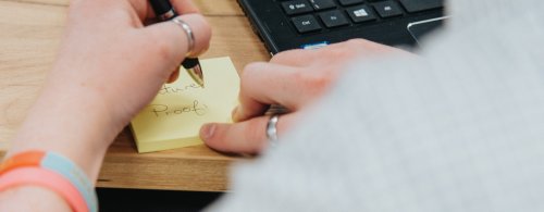 NMITE student writing on post it note; future proofing