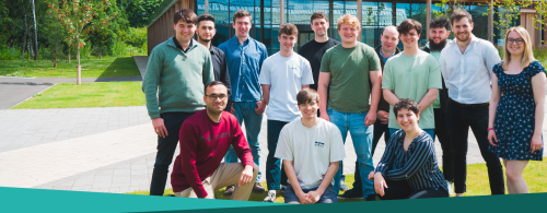 A group of NMITE's soon-to-be graduates stand outside of the NMITE Skylon Campus in a group