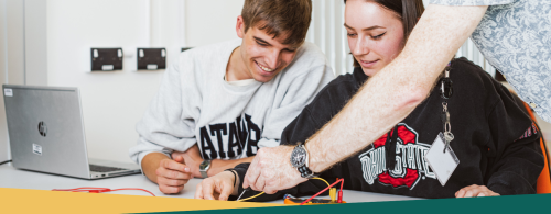 NMITE students working on an electrical engineering project 